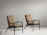 paire de chaises longues avec coussins, structure en métal noir