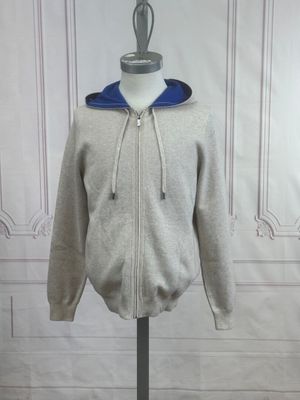 grey and blue zipped hoodie on a mannequin stand
