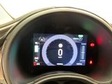 the dashboard of a car with a digital display on it