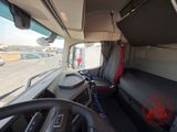 a view of the inside of a bus from the driver ' s seat