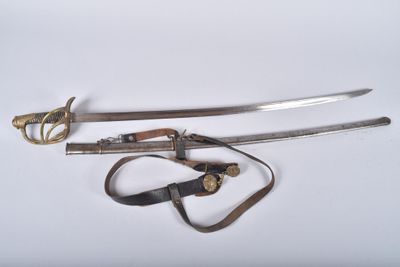 two swords and a pair of scissors on a white surface
