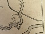 an old map of a city with a river in the middle of it