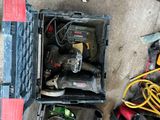 a box of tools and tools sitting on the floor