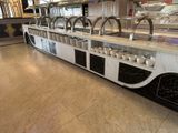 a picture of a buffet area with a variety of food items