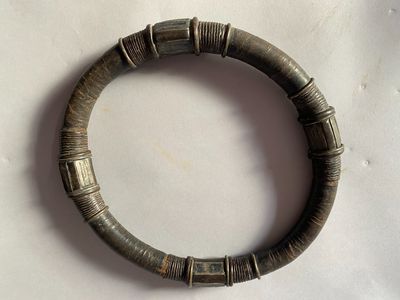 an image of a bracelet that is on a white surface