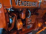 a close up view of an old tractor with the word vendeluve on it