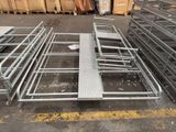 a lot of metal racks and pallets in a warehouse
