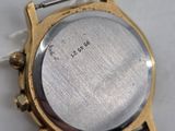 an image of a close up of a watch on a white surface