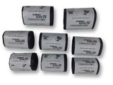 six rouleaux de pellicule noir et blanc empilés les uns sur les autres