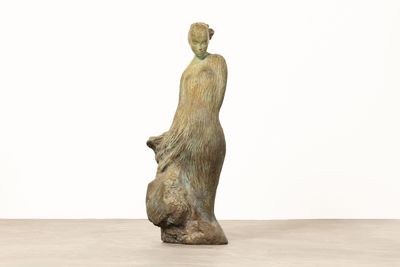 statue of a woman holding a baby in her arms