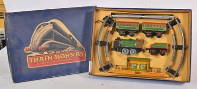a box with a train set in it on a table