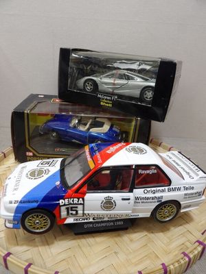 a toy car that is sitting on top of a basket