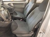 a car that has two seats in it and a steering wheel