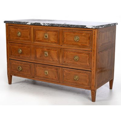 an image of a wooden dresser with a marble top