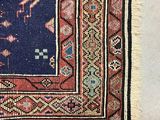 a close up of a rug with a blue background