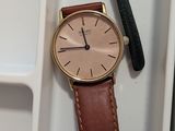a watch that is sitting in a box on the table