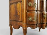 an antique chest of drawers with brass handles and drawers on each side