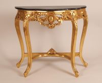 Console d'applique en bois richement mouluré, sculpté et dor…