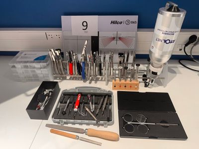 a table with a lot of tools on it