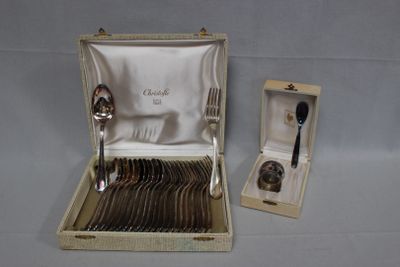 a box with silverware in it and a spoon and fork in it