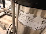 a picture of a stainless steel water heater with a label on it