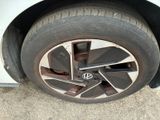 a close up of a tire on a car ' s rim