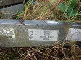 a metal object that is sitting in the grass