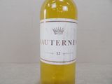 a bottle of wine that is sitting on a table