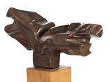 statue of a hand with a glove on a wooden base