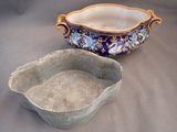 a blue and white bowl and a blue and white bowl on a table