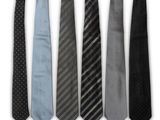 six different ties are lined up in a row on a white background
