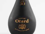 an image of a black bottle with a gold logo on it