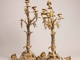 pair of antique brass candelabs with flowers and leaves