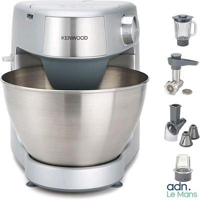 a large metal bowl with a blender and other kitchen appliances