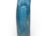 a glass vase with a blue design on it