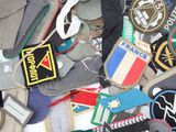 a pile of assorted patches and patches on a table