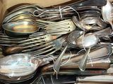 many spoons and spoons in a box together