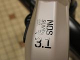 a close up of a bike with a sticker on it