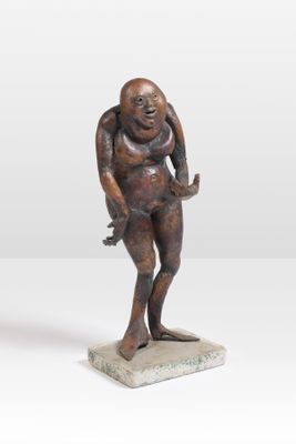 an image of a statue of a man holding a baby