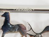 silver plated brooch depicting a horse and a dog pulling a cart