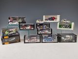 many different models of cars in a display case