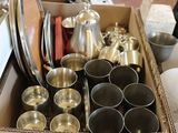a box full of silverware sitting on a table