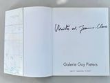 a book with a picture of a man ' s handwriting on it