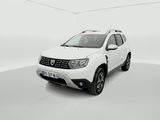 the white dacia is parked in a white room