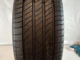 a close up of a tire on a white surface