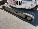 a picture of a tractor that has been left on the ground