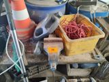 a pile of construction materials and tools on a table