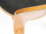 a skateboard that is sitting on top of a chair
