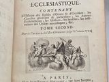 an old book with a picture of people on it