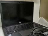 a laptop computer that is sitting on a table
